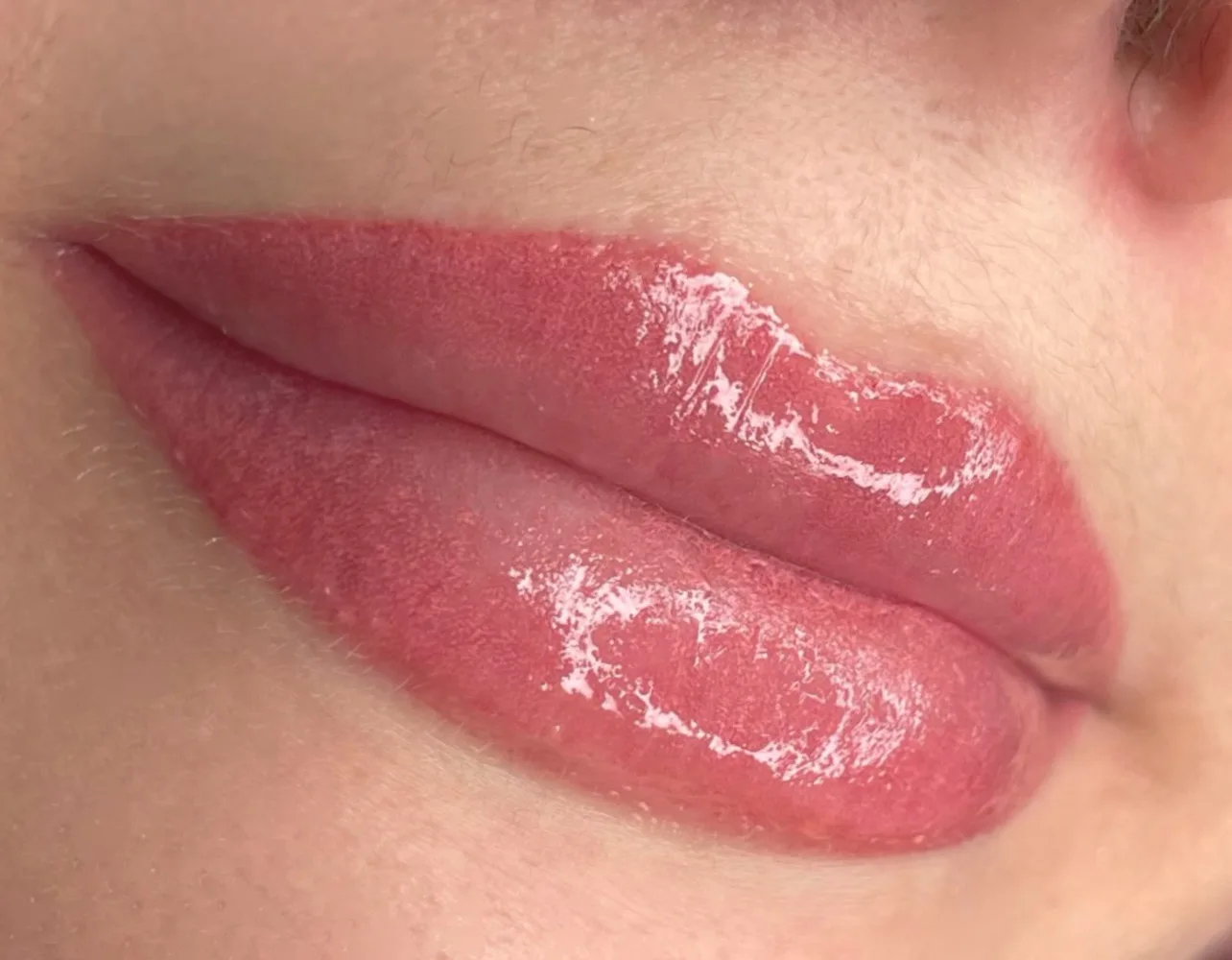 Lip blush macro — healed glossy lip colour