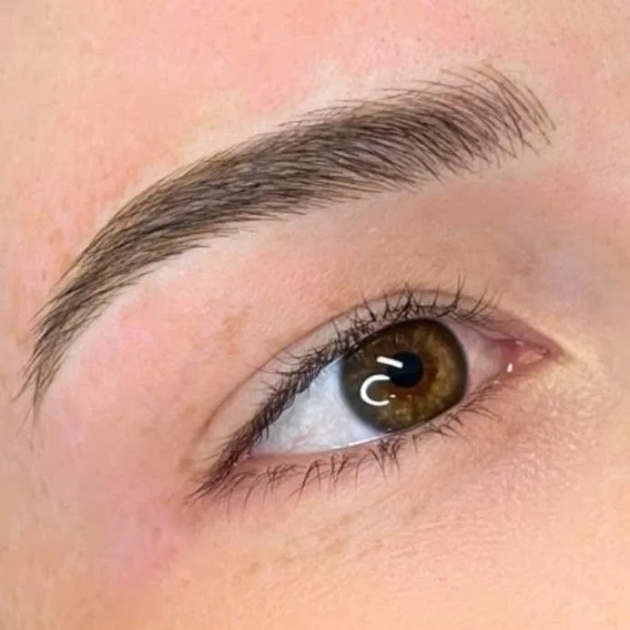 Single brow and eye — natural finish detail, close brow result